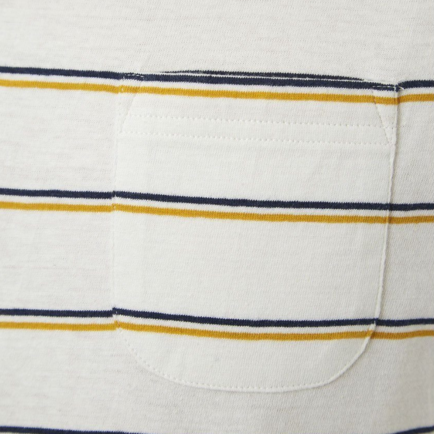 Close-up of a white fabric pocket with blue and yellow stripes.