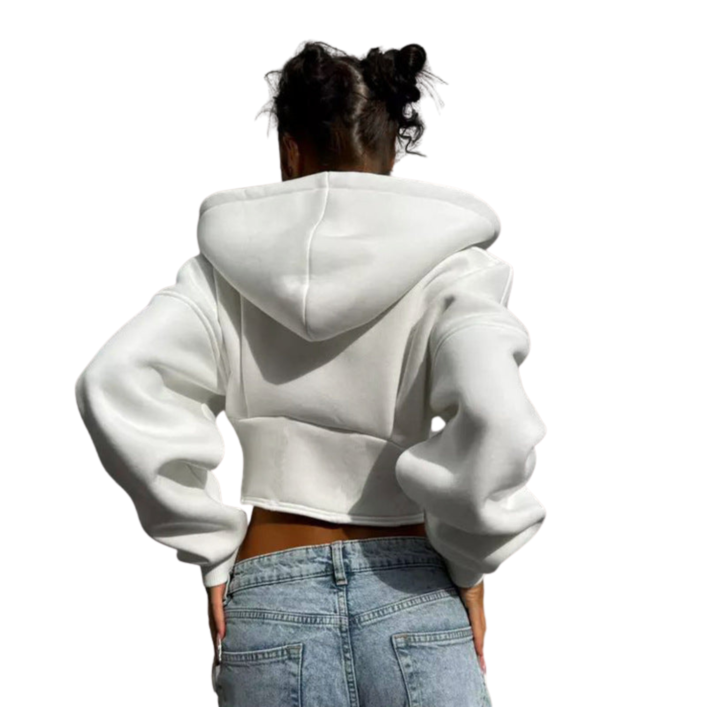 Person wearing a white hoodie and light blue jeans on a white background