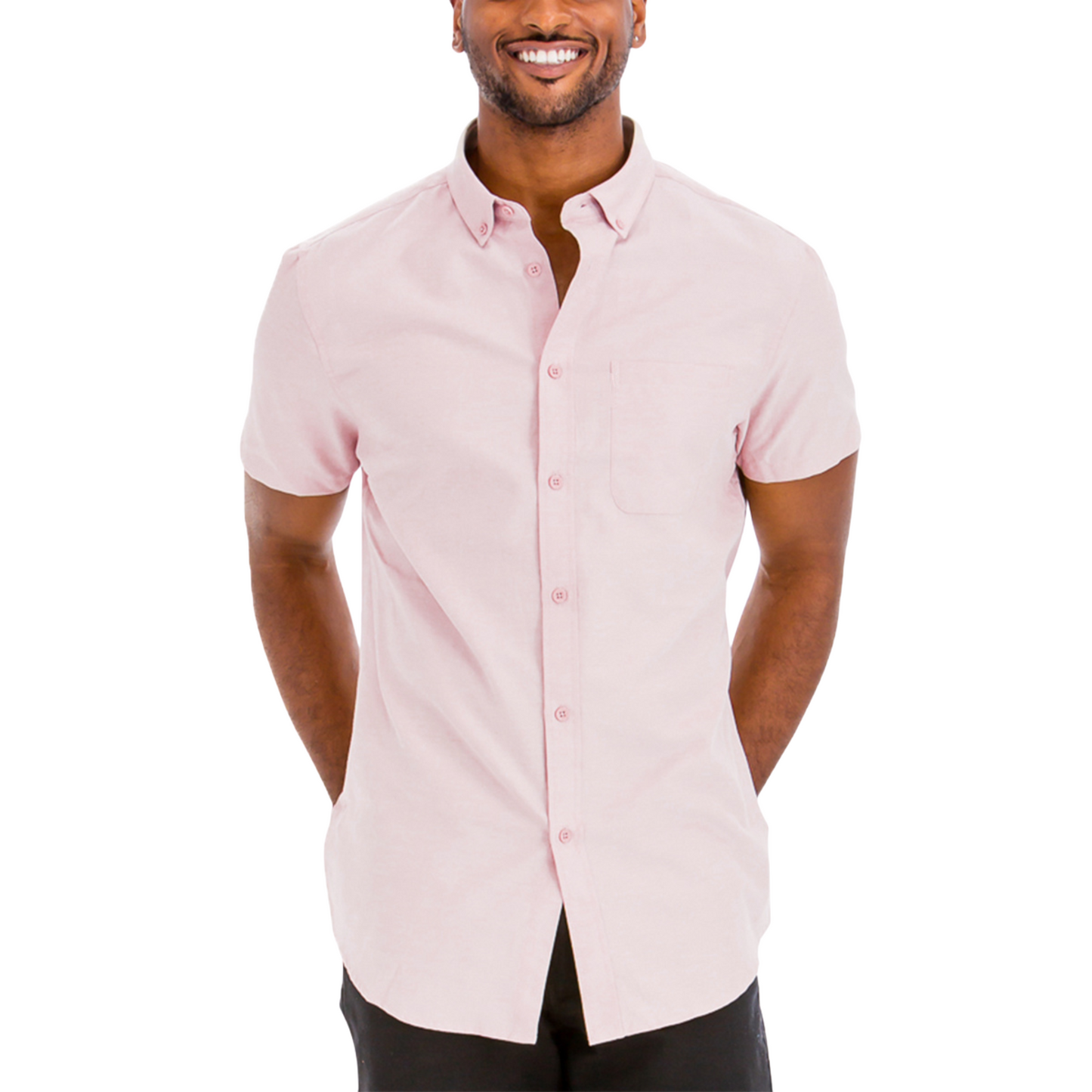 Man wearing a light pink short-sleeve button-up shirt on a white background