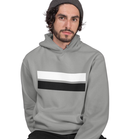 Man wearing a gray hoodie with white and black stripes on a white background