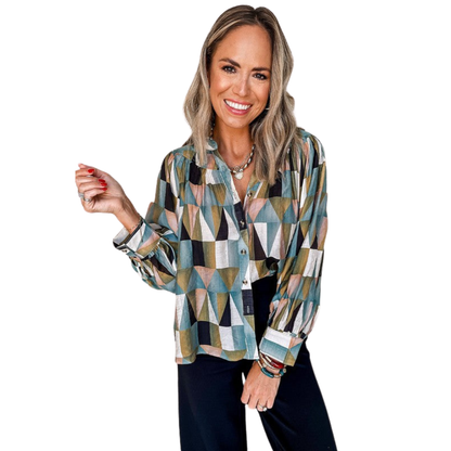 Woman wearing a patterned shirt on a white background