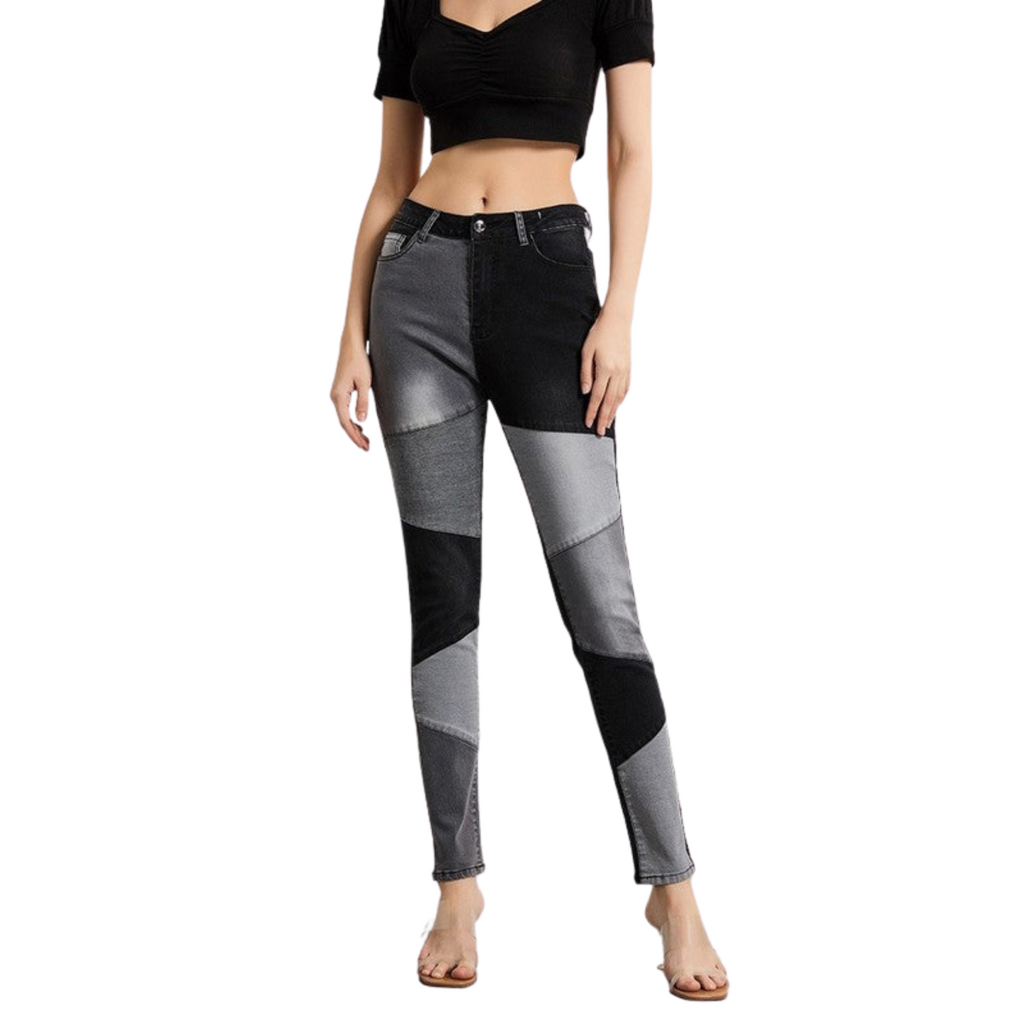 Person wearing patchwork jeans on a white background