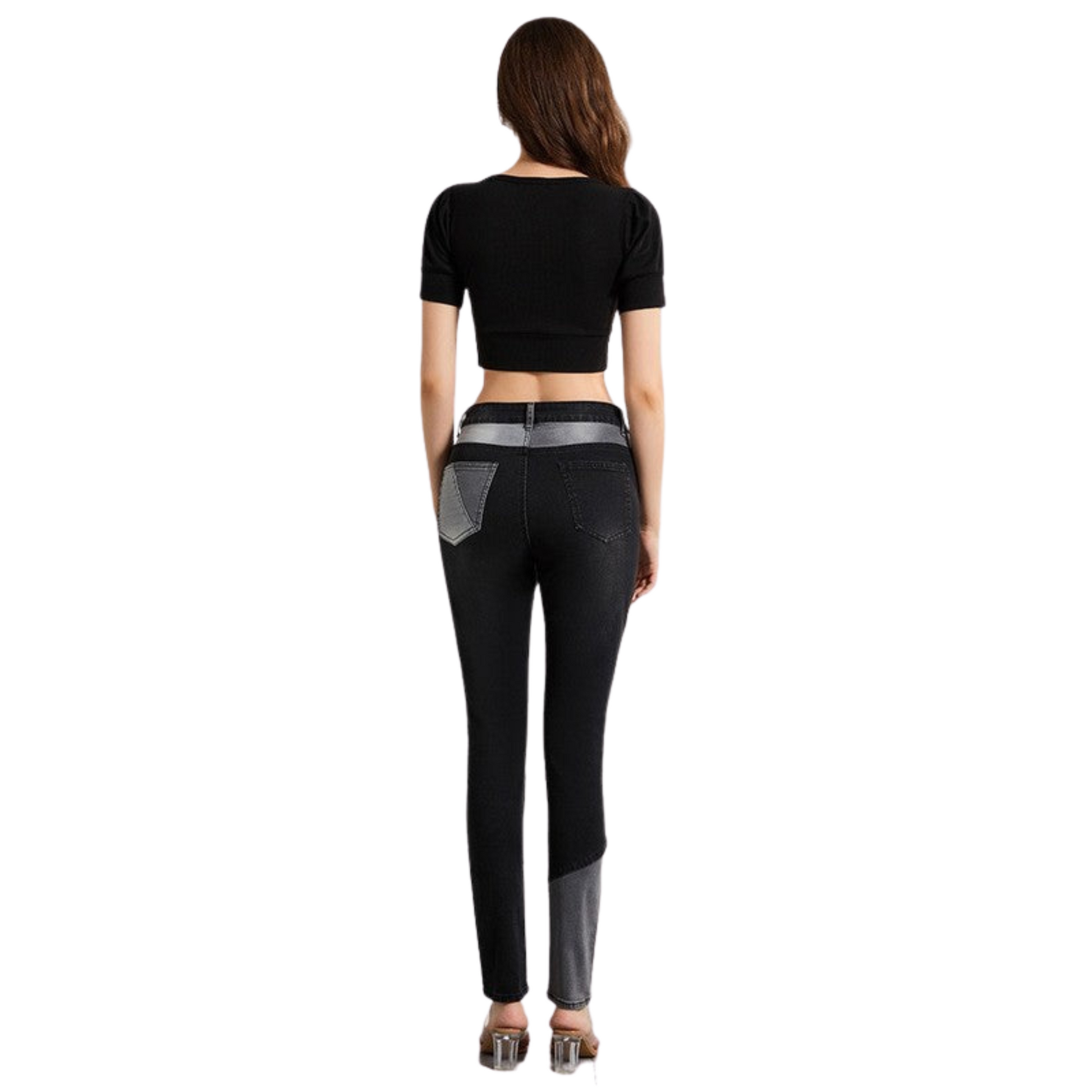 Woman wearing black leggings with gray accents on a white background