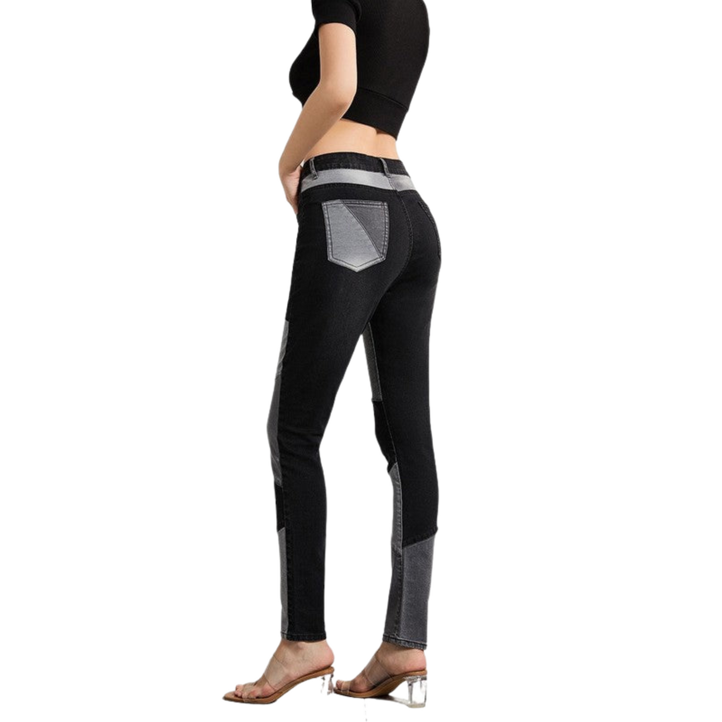 Black leggings with gray accents worn by a person on a white background