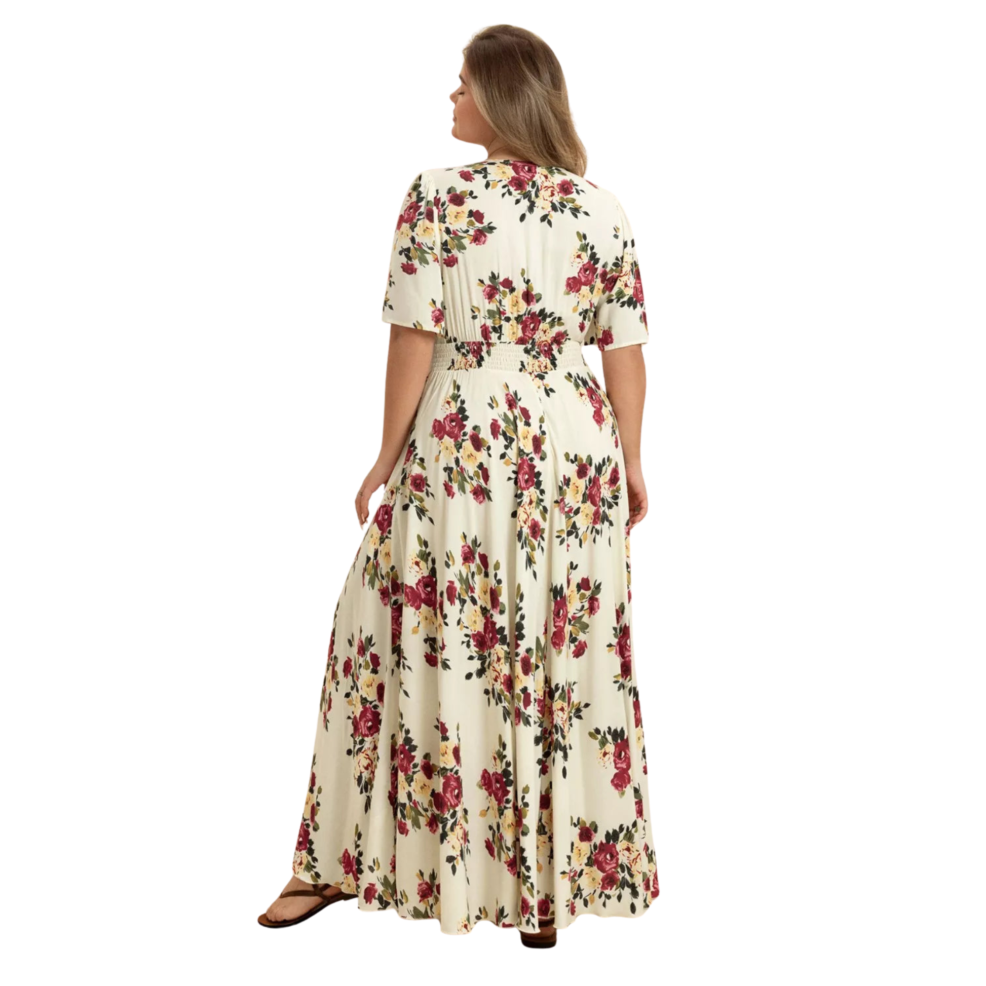 Woman wearing a floral dress on a white background