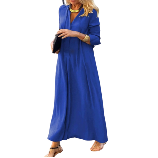 Woman wearing a blue long dress on a white background